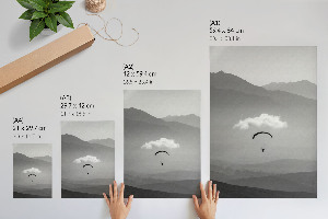 Kunstdruck auf Leinwand mit Gleitschirmfliegen in den Bergen