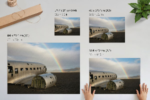 Wandposter mit Motiv eines Regenbogens und eines Schiffswracks