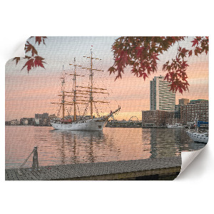 Wandposter Ein Segelschiff und ein Panorama